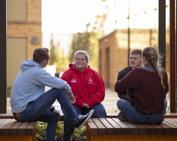 Students chatting outside St Marks accommodation