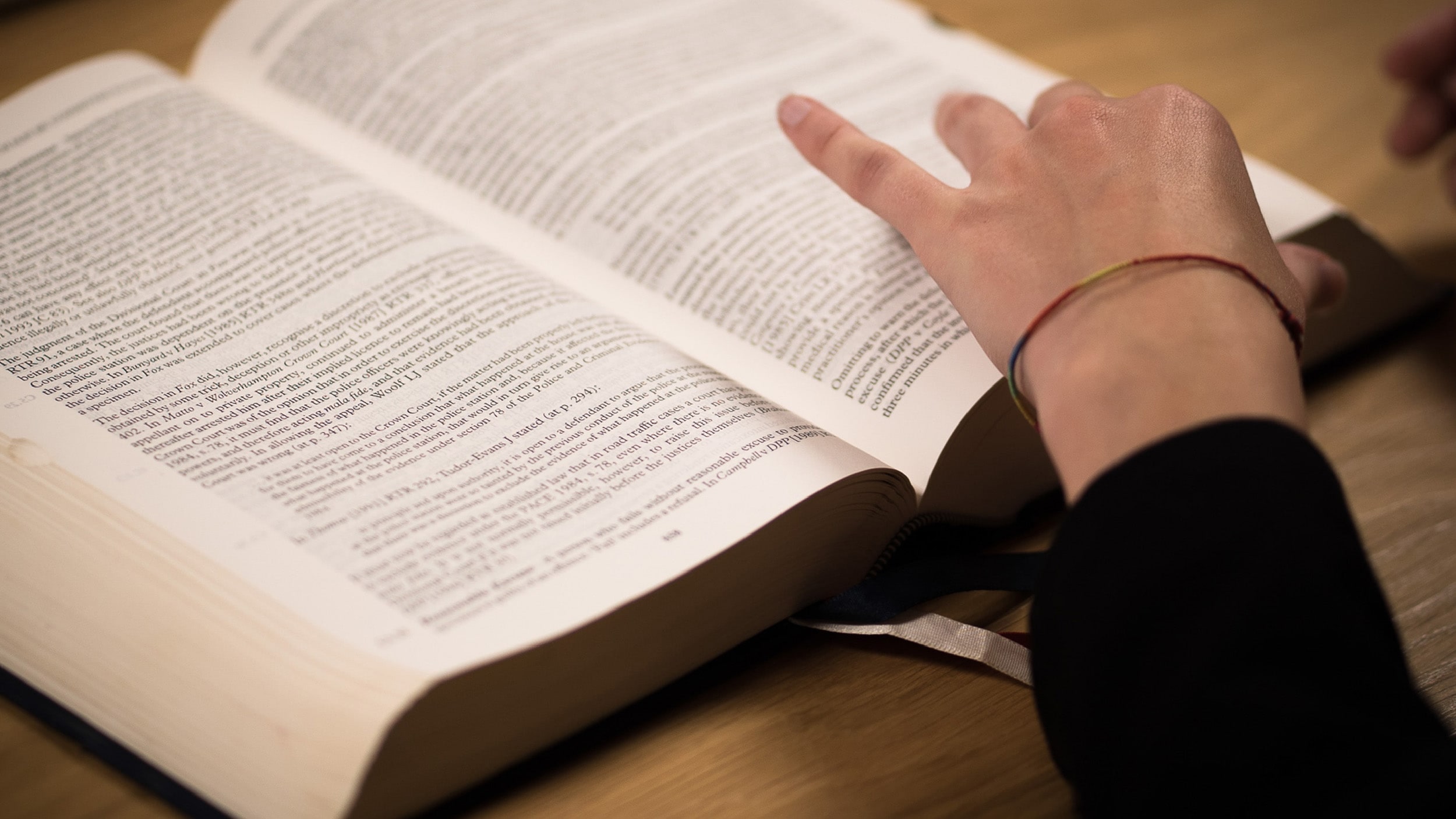Law student reading a book