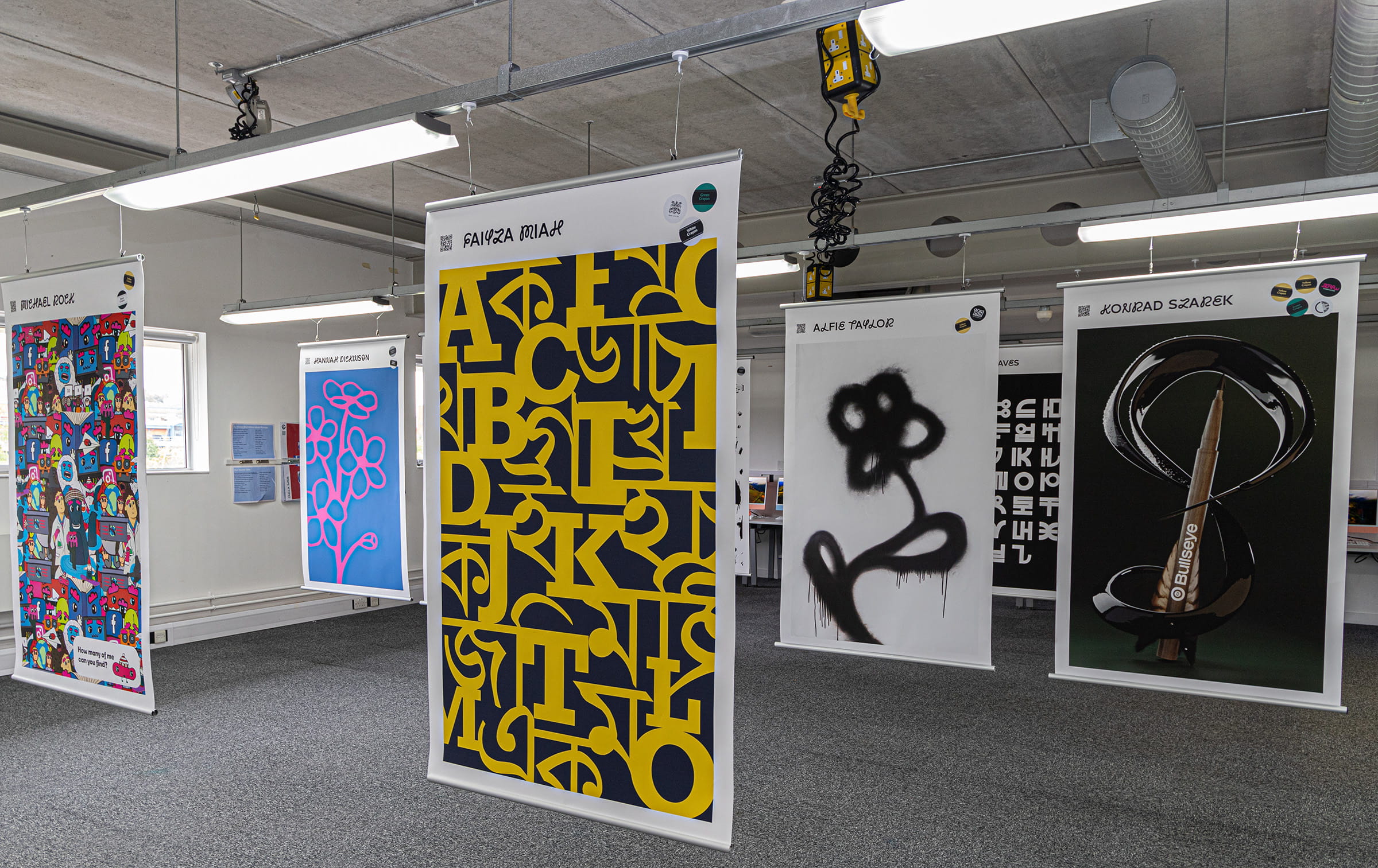 A graphic Design Student looking at graphic designs