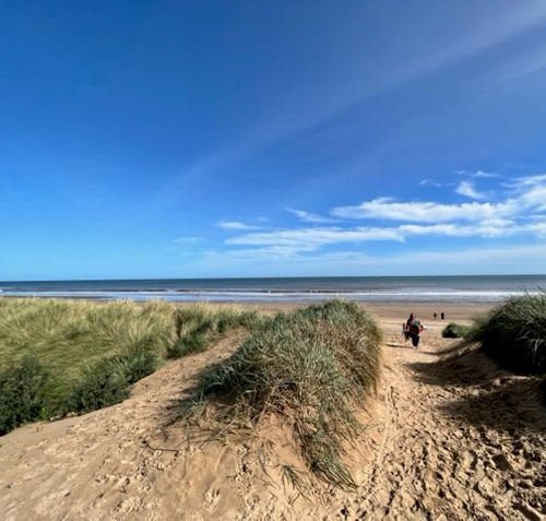 Sand dunes and sea